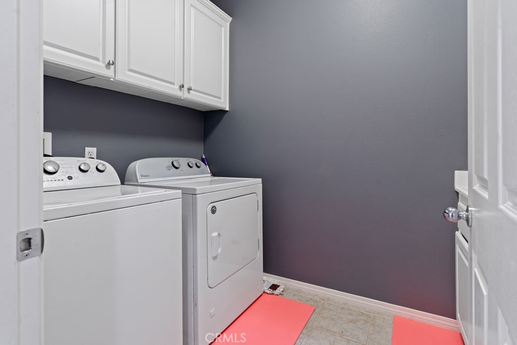 42914 Tomayo Street Indio, CA 92203 - Photo 24 of 31 a utility room with dryer and washer