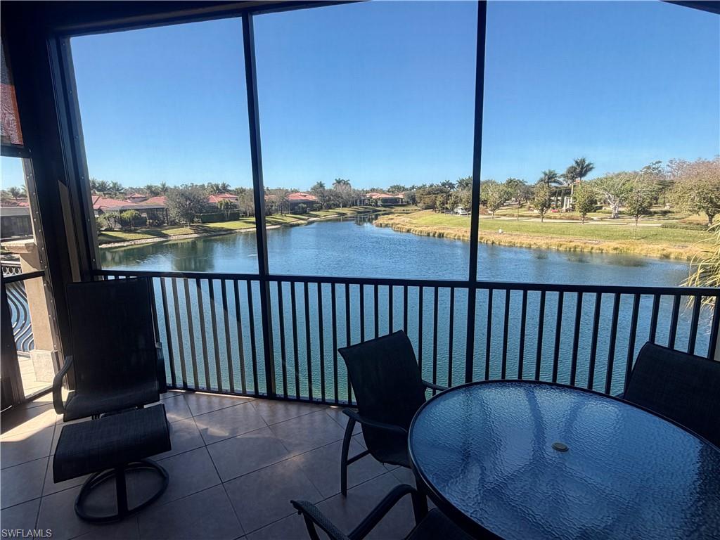 9109 Prima Way, Unit 201 Naples, FL 34113 - Photo 30 of 49 No-See-Um Screened Lanai with Electric Storm Smart Shutters for Additional Protection