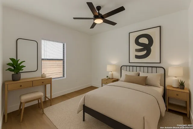 a bedroom with a bed and a chair