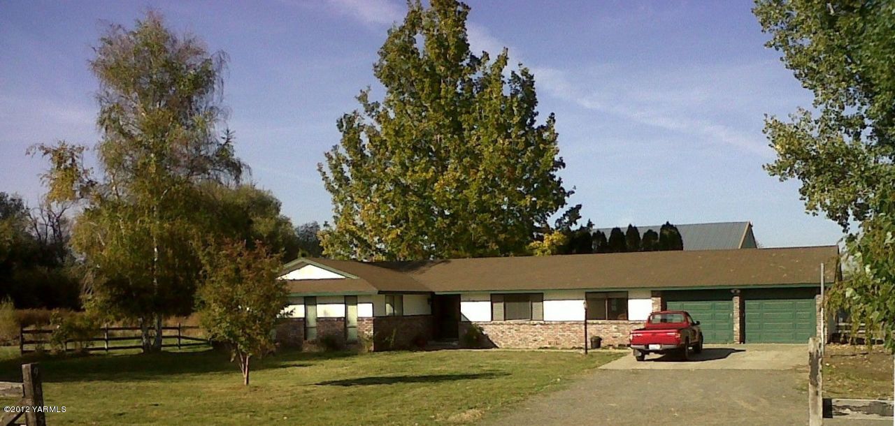 a car parked in front of a house