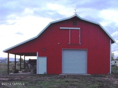 9605 Meadowbrook Road Yakima, WA 98903 - Photo 4 of 6 a view of a house with backyard