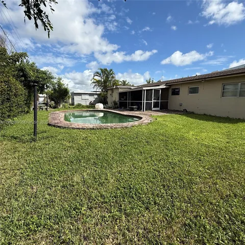 a front view of house with yard