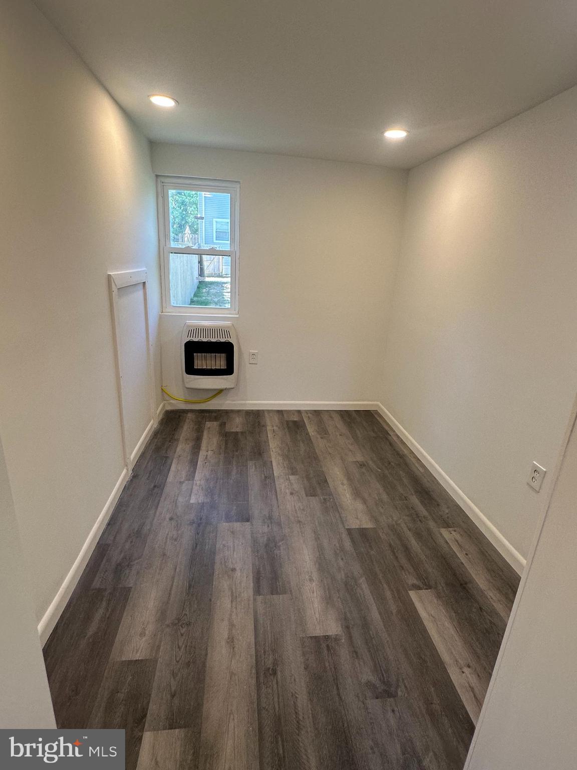 1411 Zebley Road, Unit A Garnet Valley, PA 19060 - Photo 16 of 17 wooden floor in an empty room with a window