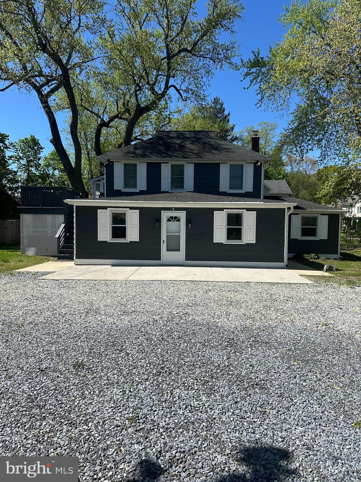 1411 Zebley Road, Unit A Garnet Valley, PA 19060 - Photo 17 of 17 a house with trees in the background