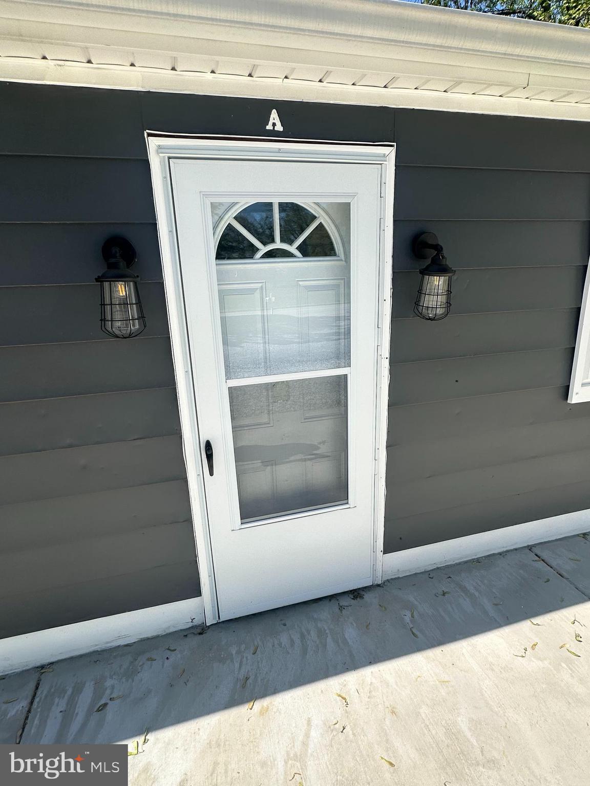 1411 Zebley Road, Unit A Garnet Valley, PA 19060 - Photo 2 of 17 a view of front door