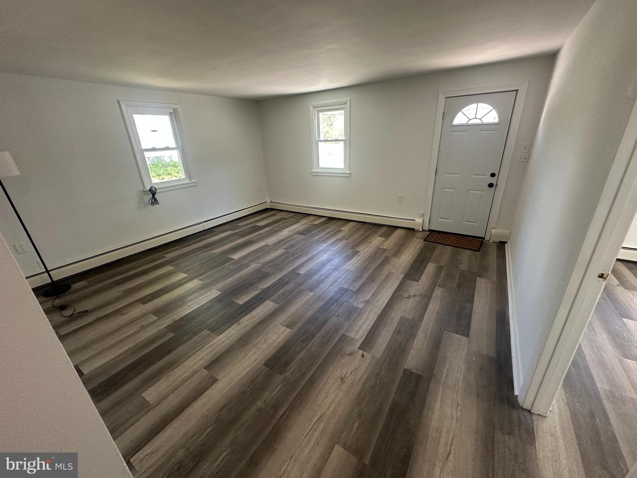 1411 Zebley Road, Unit A Garnet Valley, PA 19060 - Photo 4 of 17 wooden floor in an empty room