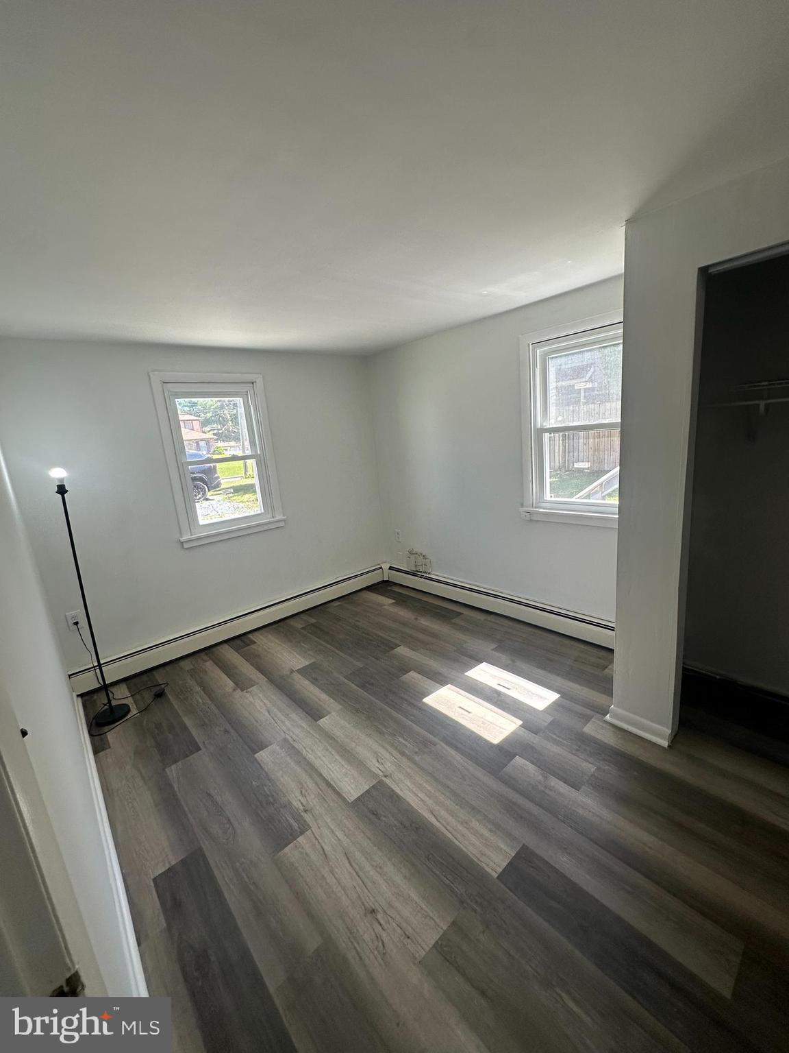 1411 Zebley Road, Unit A Garnet Valley, PA 19060 - Photo 5 of 17 a view of empty room with wooden floor and fan