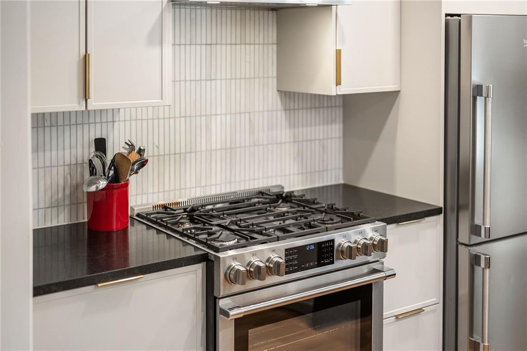 3359 Northbrook Drive Atlanta, GA 30340 - Photo 12 of 61 a stove top oven sitting inside of a kitchen