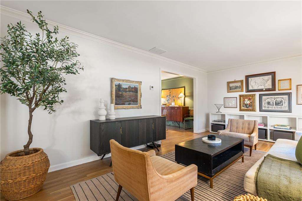 3359 Northbrook Drive Atlanta, GA 30340 - Photo 26 of 61 a living room with furniture a table and a potted plant