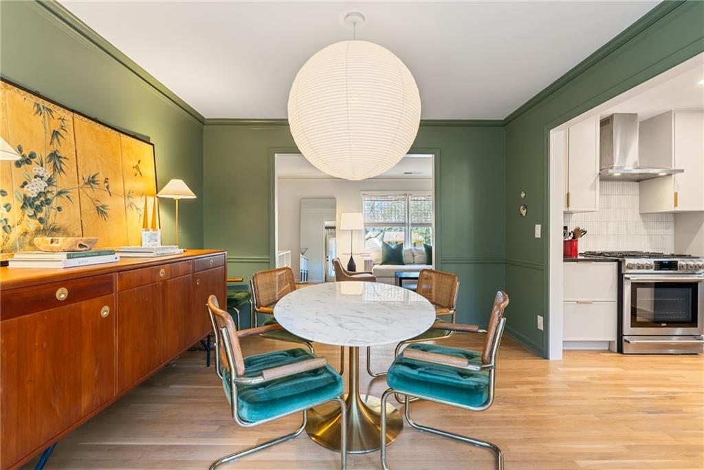 3359 Northbrook Drive Atlanta, GA 30340 - Photo 33 of 61 a room with furniture a rug and a chandelier