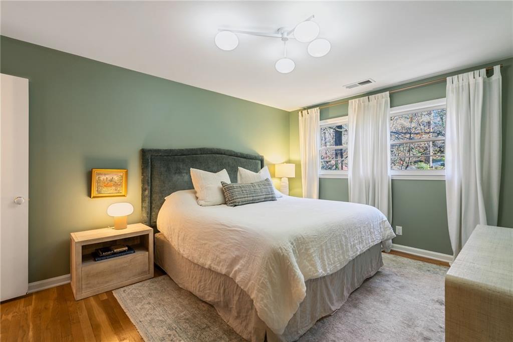 3359 Northbrook Drive Atlanta, GA 30340 - Photo 42 of 61 a bedroom with a large bed and a window