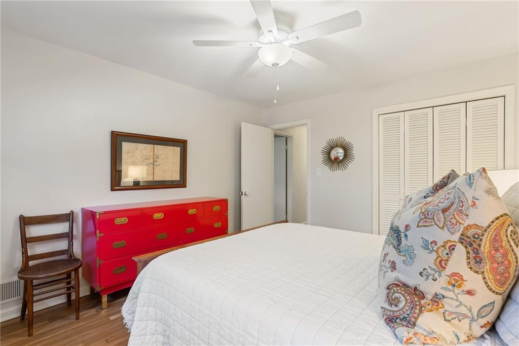 3359 Northbrook Drive Atlanta, GA 30340 - Photo 46 of 61 a bedroom with a bed and a dresser