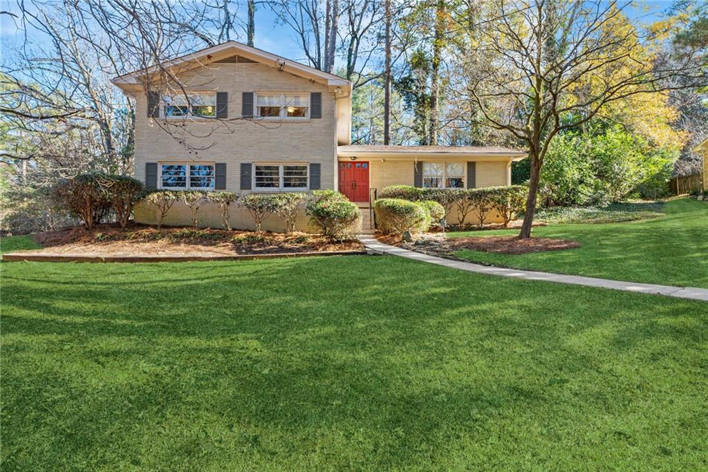 3359 Northbrook Drive Atlanta, GA 30340 - Photo 60 of 61 a front view of a house with a yard and porch