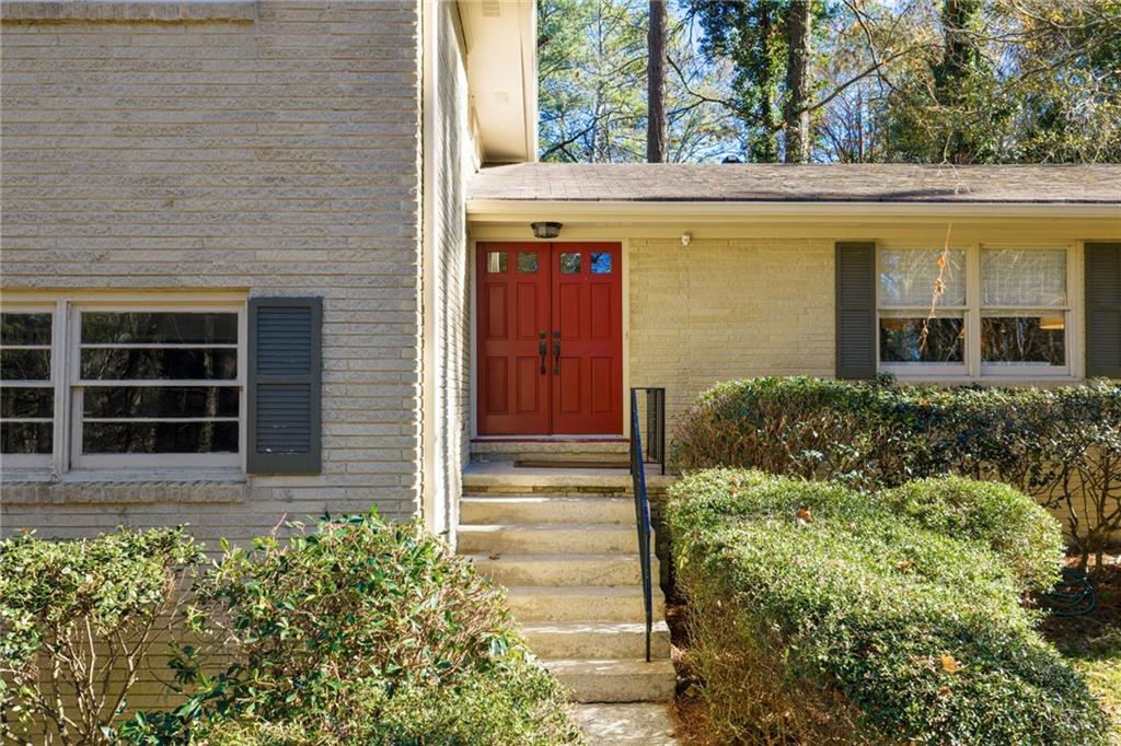 3359 Northbrook Drive Atlanta, GA 30340 - Photo 61 of 61 front view of a brick house with a large window