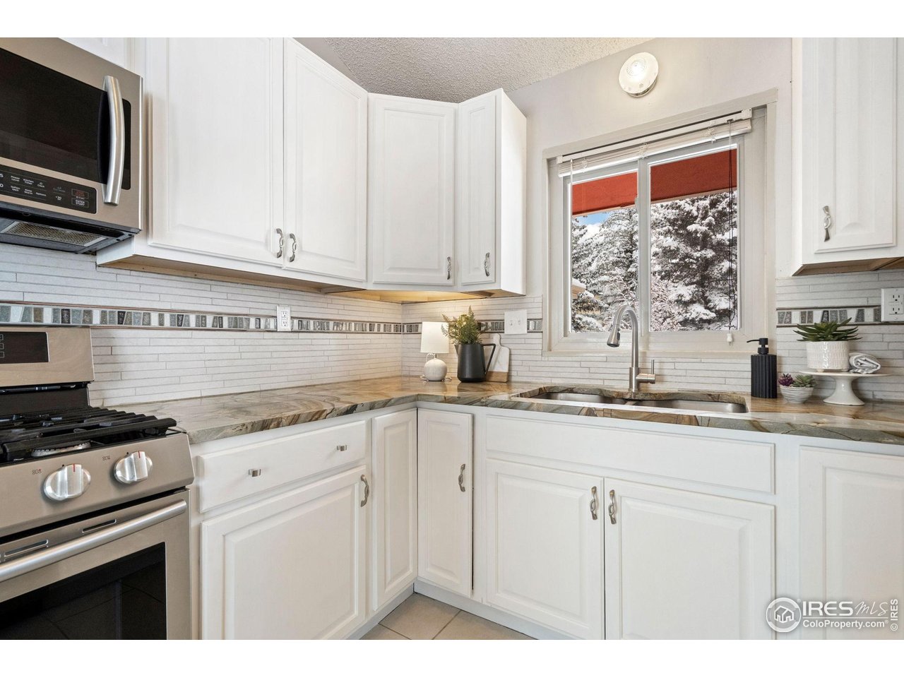 8108 Buck Ridge Lane Loveland, CO 80538 - Photo 13 of 47 kitchen