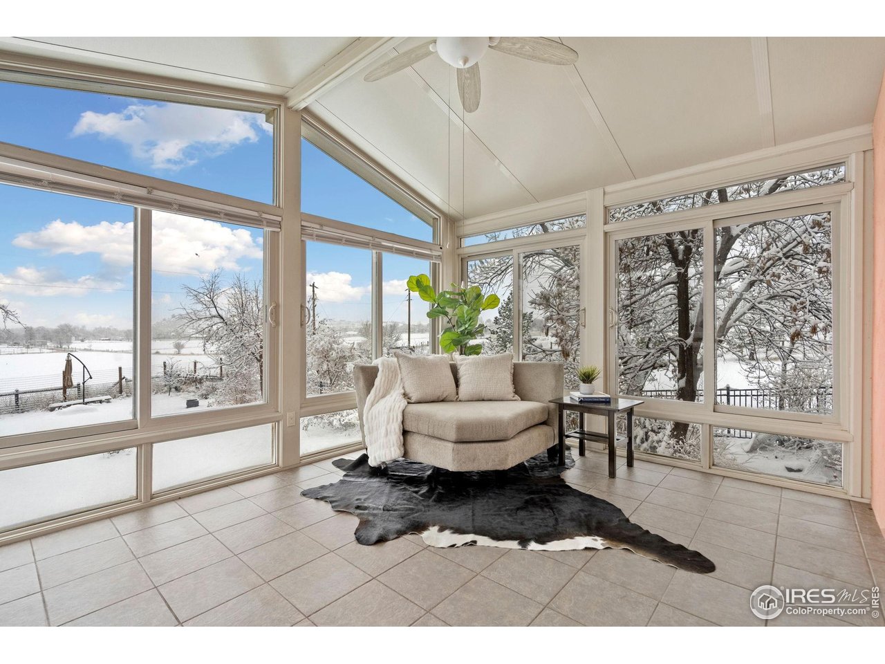 8108 Buck Ridge Lane Loveland, CO 80538 - Photo 18 of 47 Sunroom with Views!