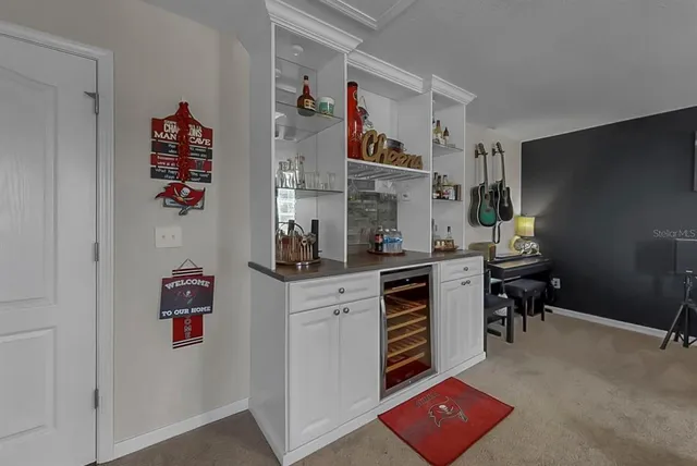 a bedroom with bed and a couch