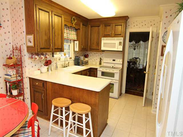 8805 Lomas Court Raleigh, NC 27615 - Photo 7 of 25 Kitchen