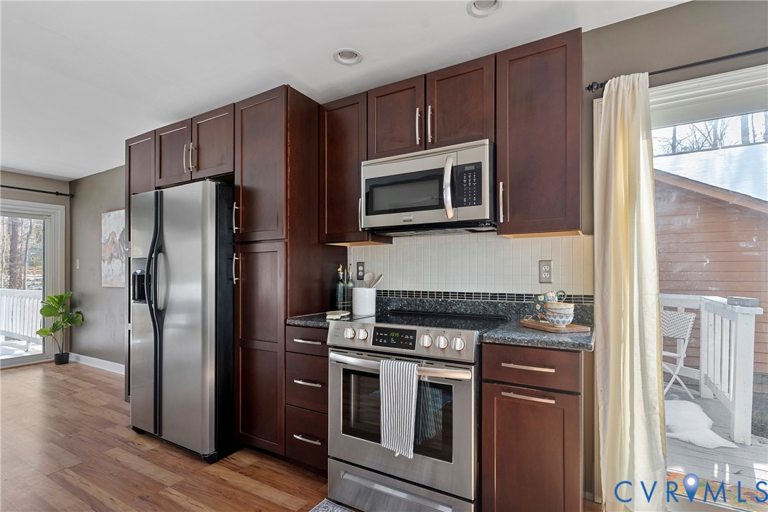3025 3 Bridges Road Midlothian, VA 23112 - Photo 11 of 22 Kitchen featuring plenty of natural light, stainle