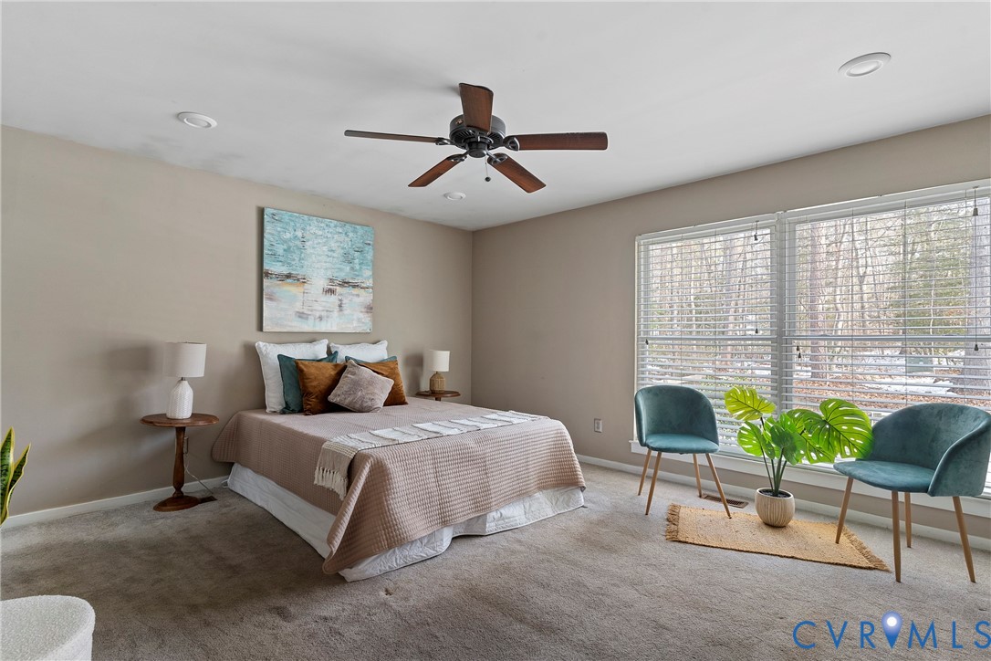 3025 3 Bridges Road Midlothian, VA 23112 - Photo 14 of 22 Carpeted bedroom featuring a ceiling fan and baseb