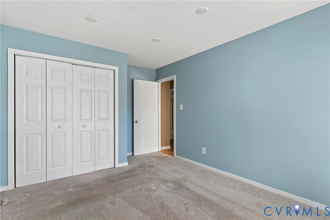 3025 3 Bridges Road Midlothian, VA 23112 - Photo 18 of 22 Unfurnished bedroom featuring carpet floors and a
