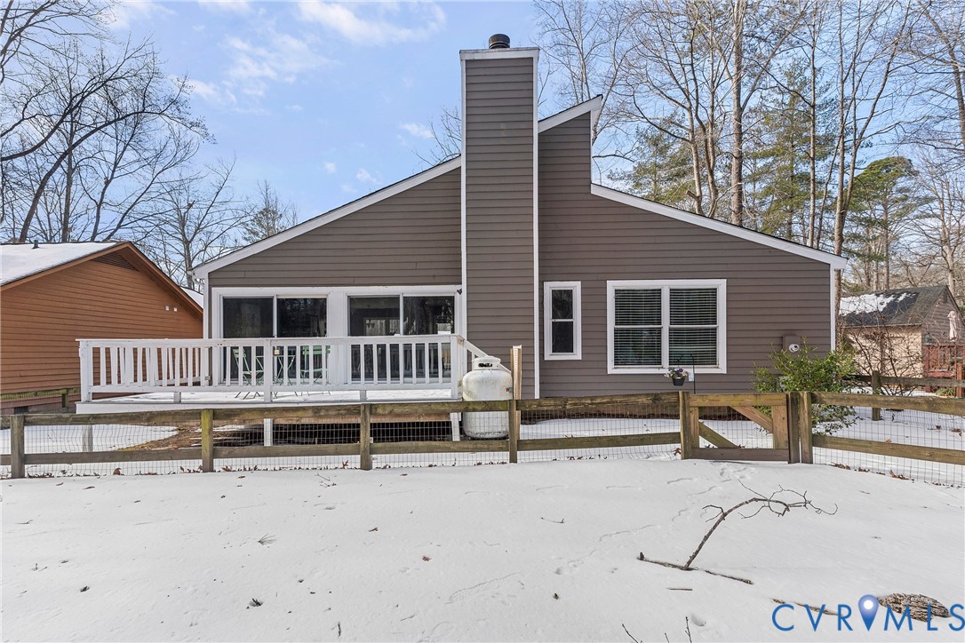3025 3 Bridges Road Midlothian, VA 23112 - Photo 21 of 22 Snow covered back of property featuring a wooden d