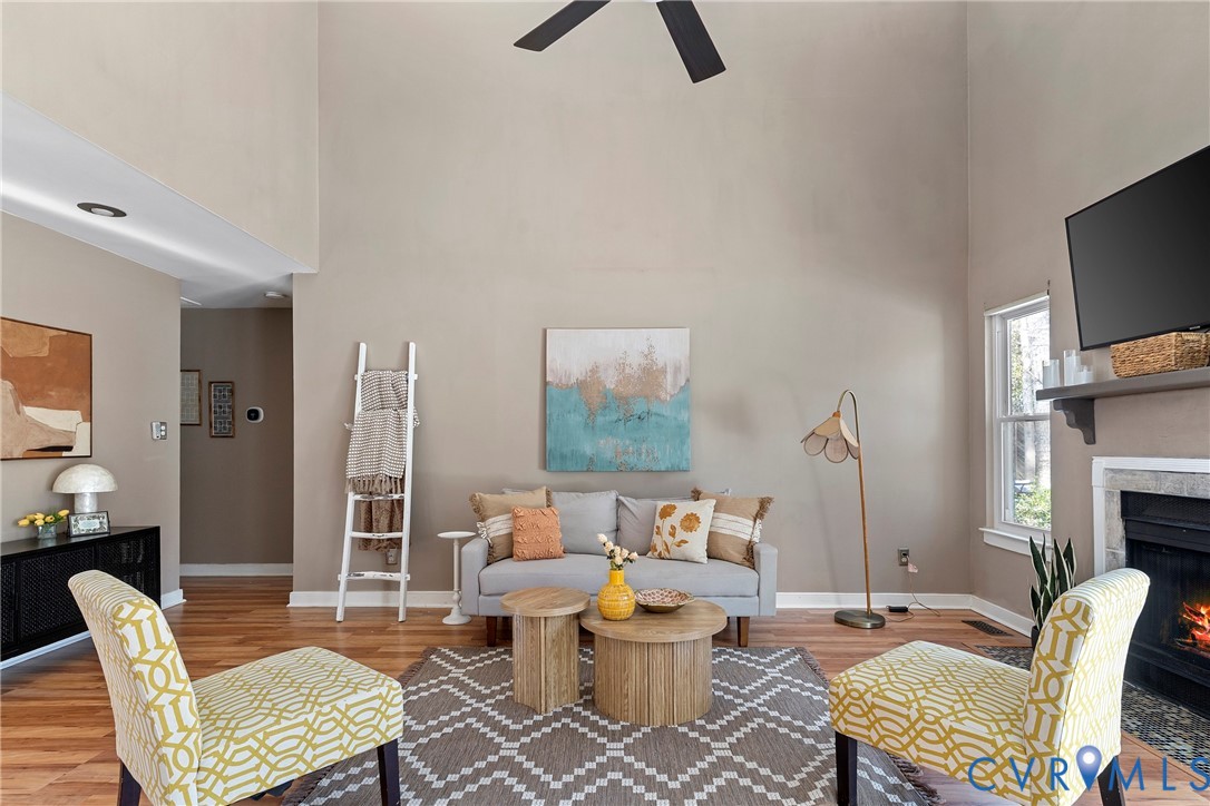 3025 3 Bridges Road Midlothian, VA 23112 - Photo 5 of 22 Living area featuring a fireplace with flush heart