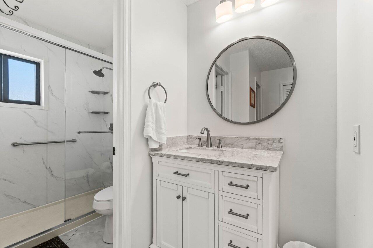 4862 Equestrian Road, Unit A Boynton Beach, FL 33436 - Photo 17 of 26 Primary Bath