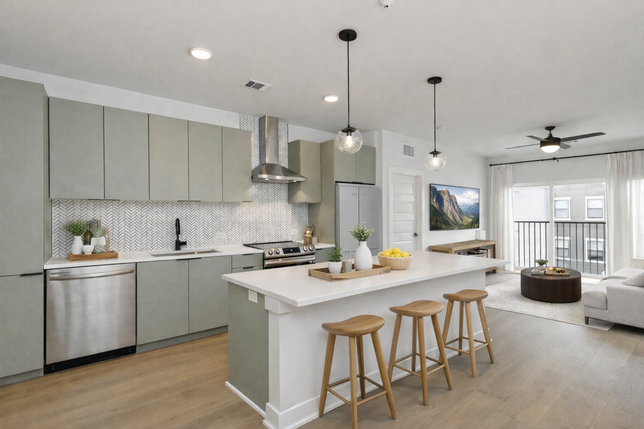 2500 Longview Street, Unit 518 Austin, TX 78705 - Photo 2 of 20 Kitchen with appliances with stainless steel finishes, wall chimney exhaust hood, gray cabinetry, a sink, and recessed lighting