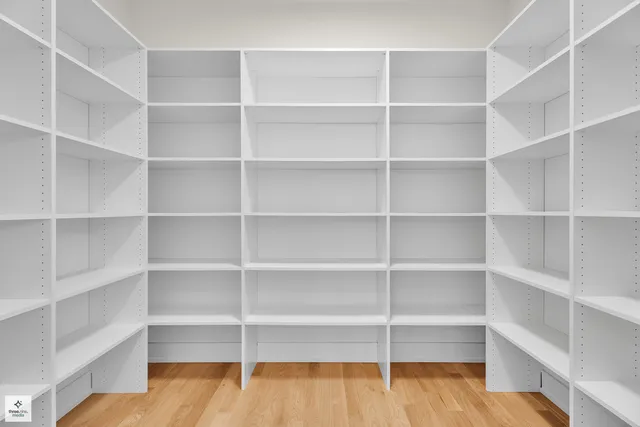 a view of room with empty empty shelves
