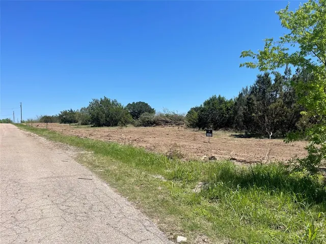 a view of a lush green field