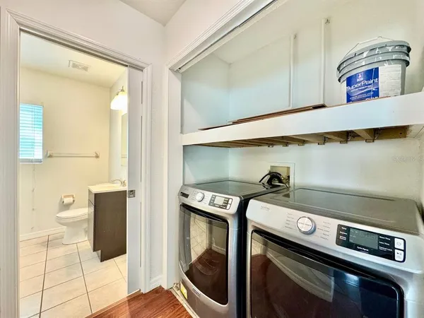 a utility room with dryer and washer
