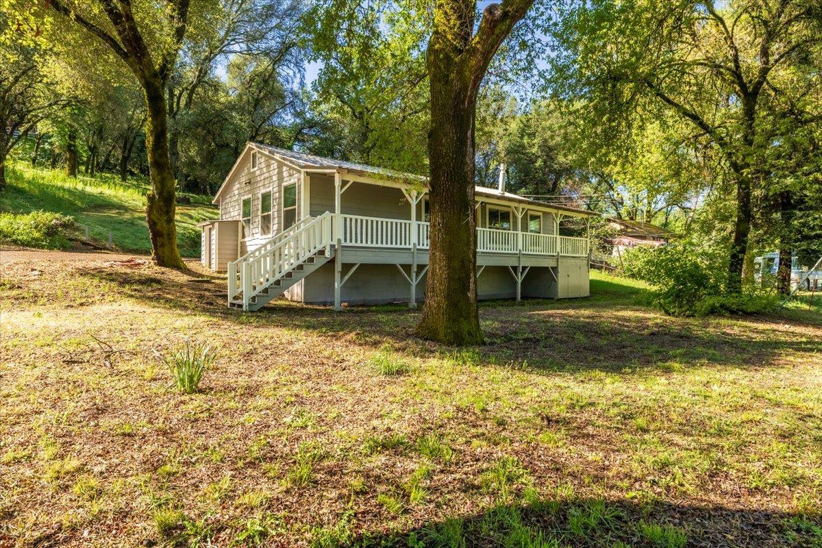 13630 Dry Creek Road Auburn, CA 95602 - Photo 2 of 46 a view of a house with a yard