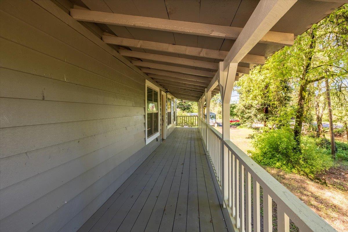13630 Dry Creek Road Auburn, CA 95602 - Photo 4 of 46 a view of a balcony with wooden floor