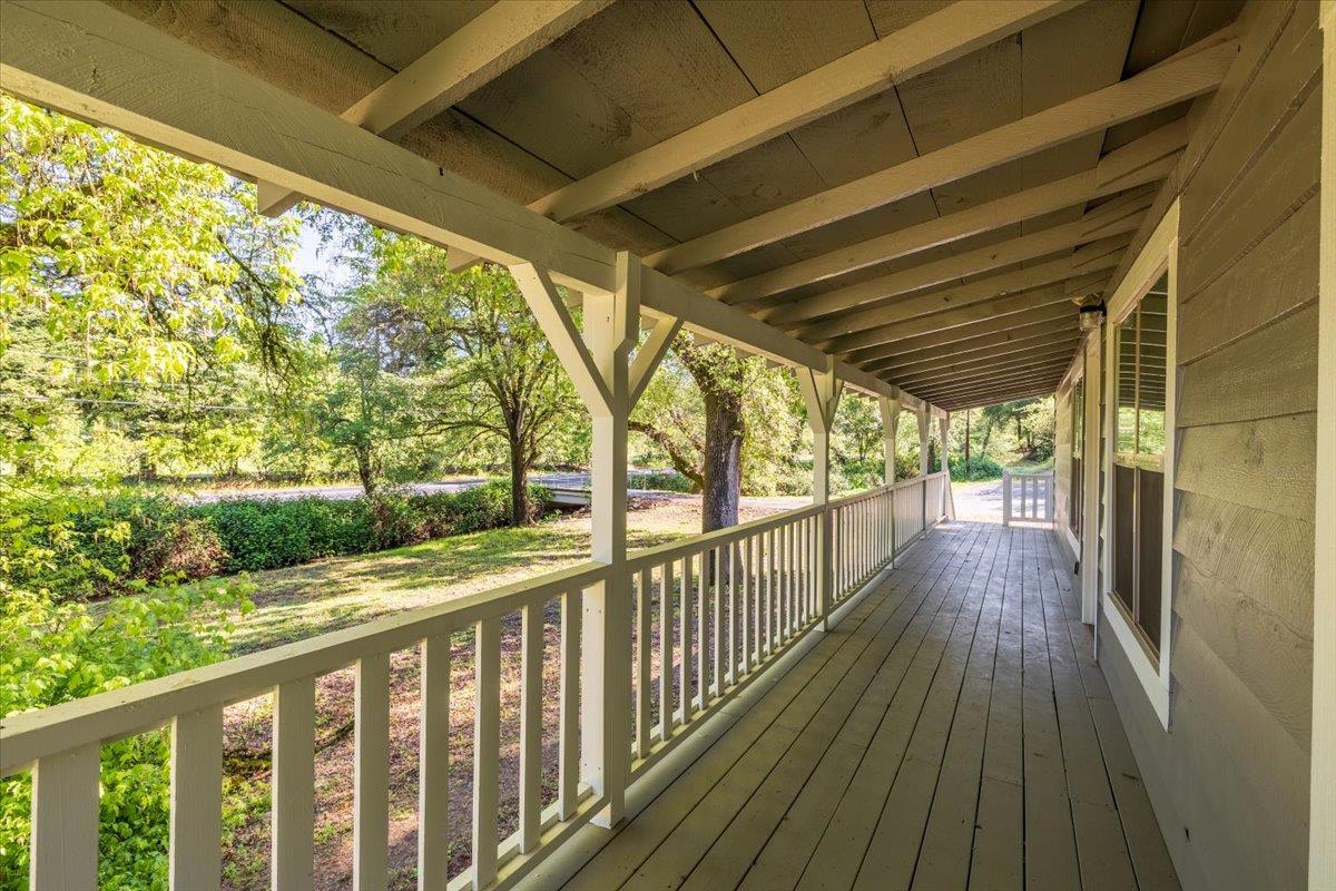 13630 Dry Creek Road Auburn, CA 95602 - Photo 5 of 46 a view of a balcony with wooden floor