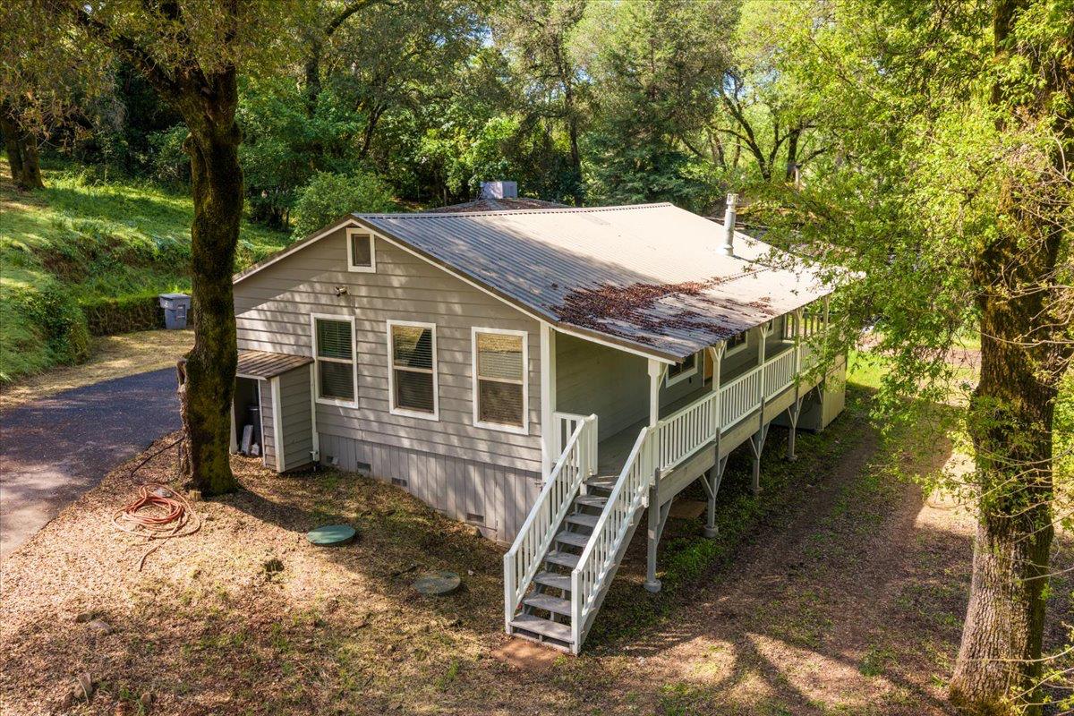 13630 Dry Creek Road Auburn, CA 95602 - Photo 7 of 46 a front view of a house with a yard