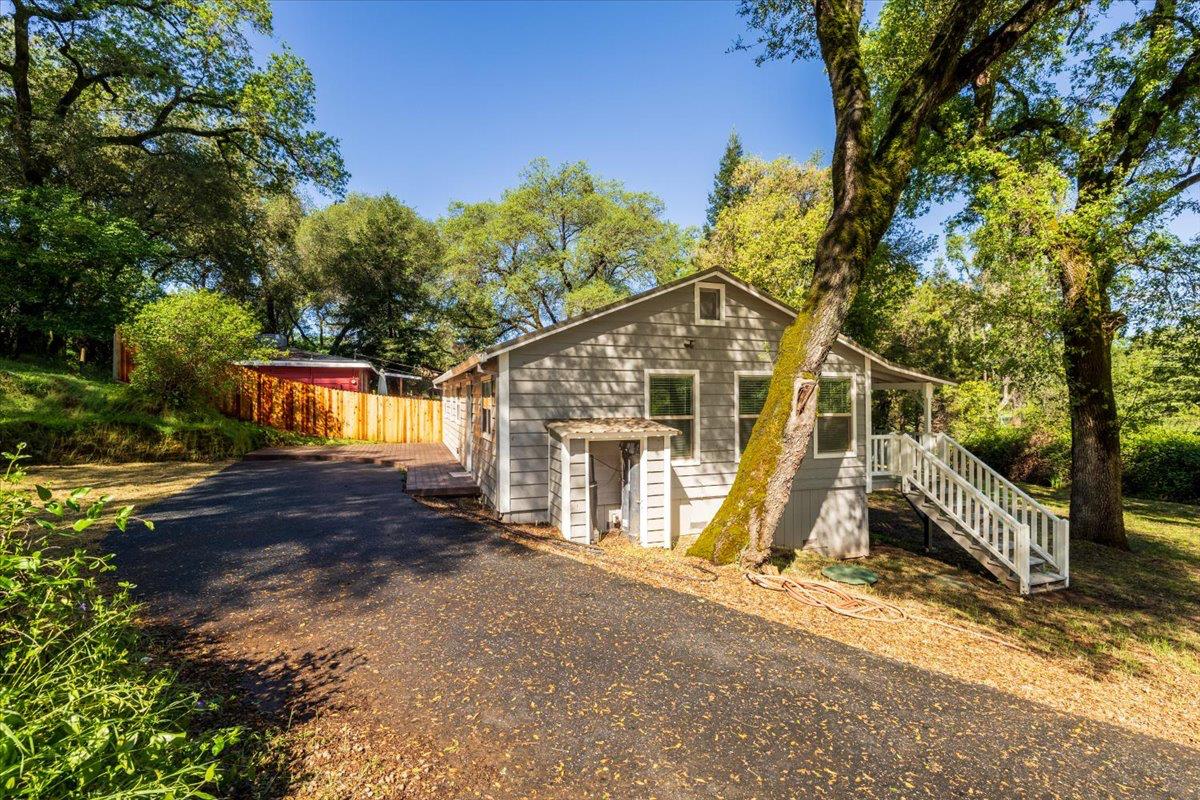 13630 Dry Creek Road Auburn, CA 95602 - Photo 10 of 46 a view of a house with basketball court