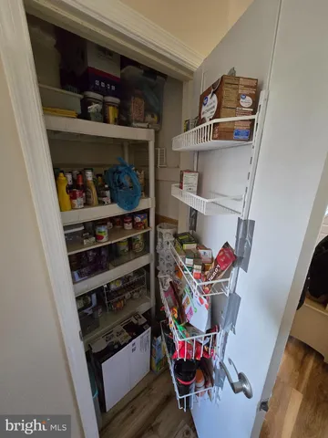 a kitchen with stainless steel appliances granite countertop a stove a sink dishwasher and a refrigerator