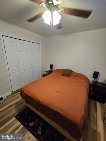 a bathroom with a sink toilet and mirror