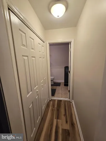 a bed room with a bed window and dresser