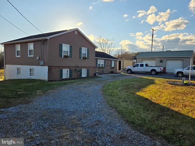 a view of a yard with an outdoor space