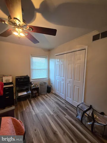 a room with furniture and a flat screen tv