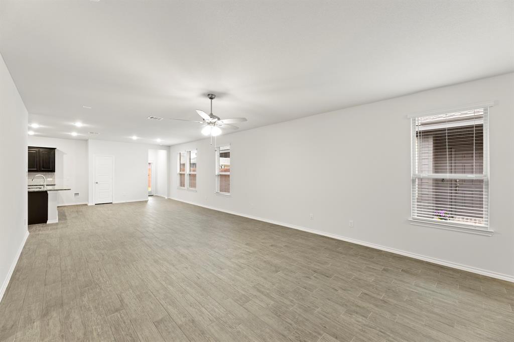 1708 Potomac Lane Blue Ridge, TX 75424 - Photo 11 of 27 a view of an empty room with kitchen and window