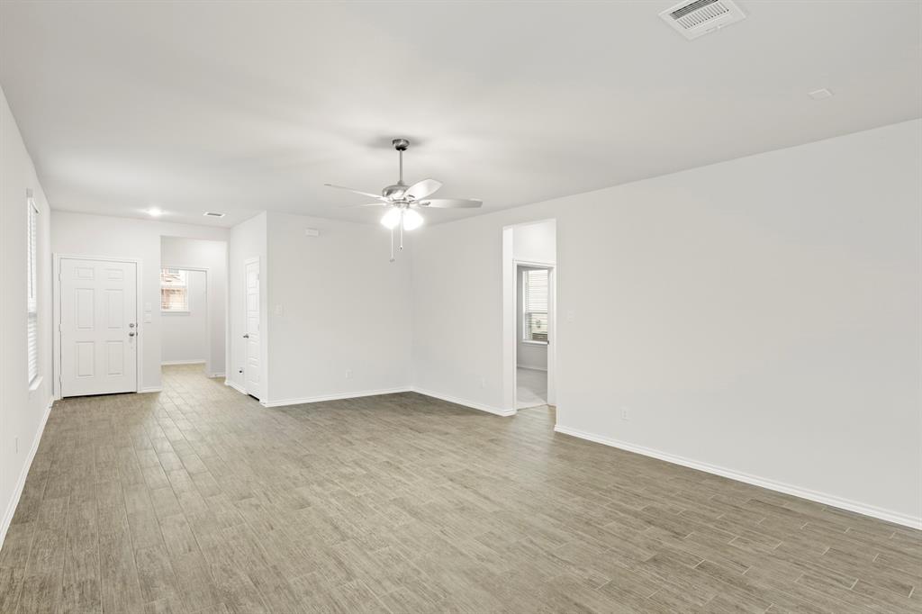 1708 Potomac Lane Blue Ridge, TX 75424 - Photo 13 of 27 a view of an empty room with wooden floor