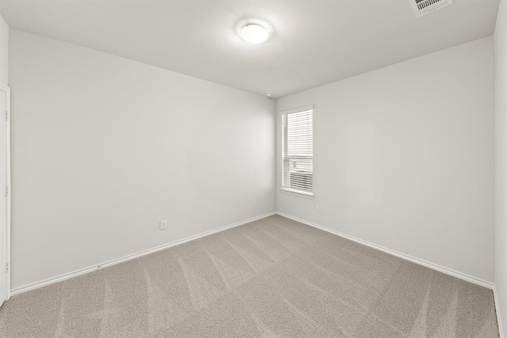 1708 Potomac Lane Blue Ridge, TX 75424 - Photo 16 of 27 a view of an empty room and a window