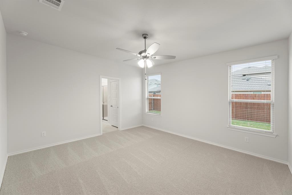 1708 Potomac Lane Blue Ridge, TX 75424 - Photo 18 of 27 wooden floor in an empty room with a window