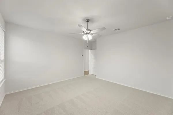 a bathroom with double sink and a mirror
