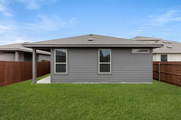a view of a backyard with barn