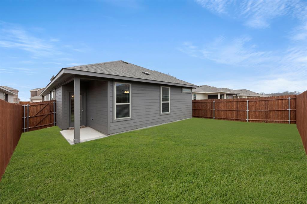 1708 Potomac Lane Blue Ridge, TX 75424 - Photo 27 of 27 a view of a backyard with barn