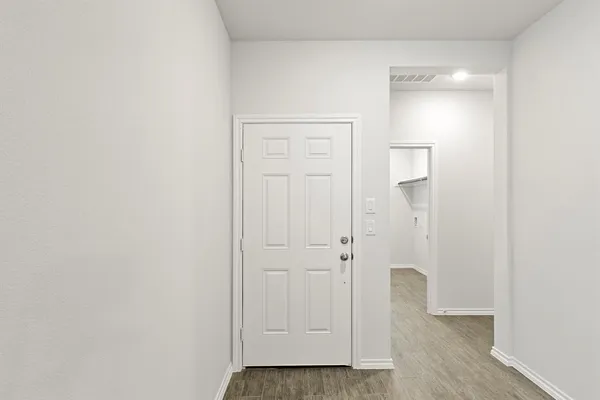 a view of room with hardwood floor
